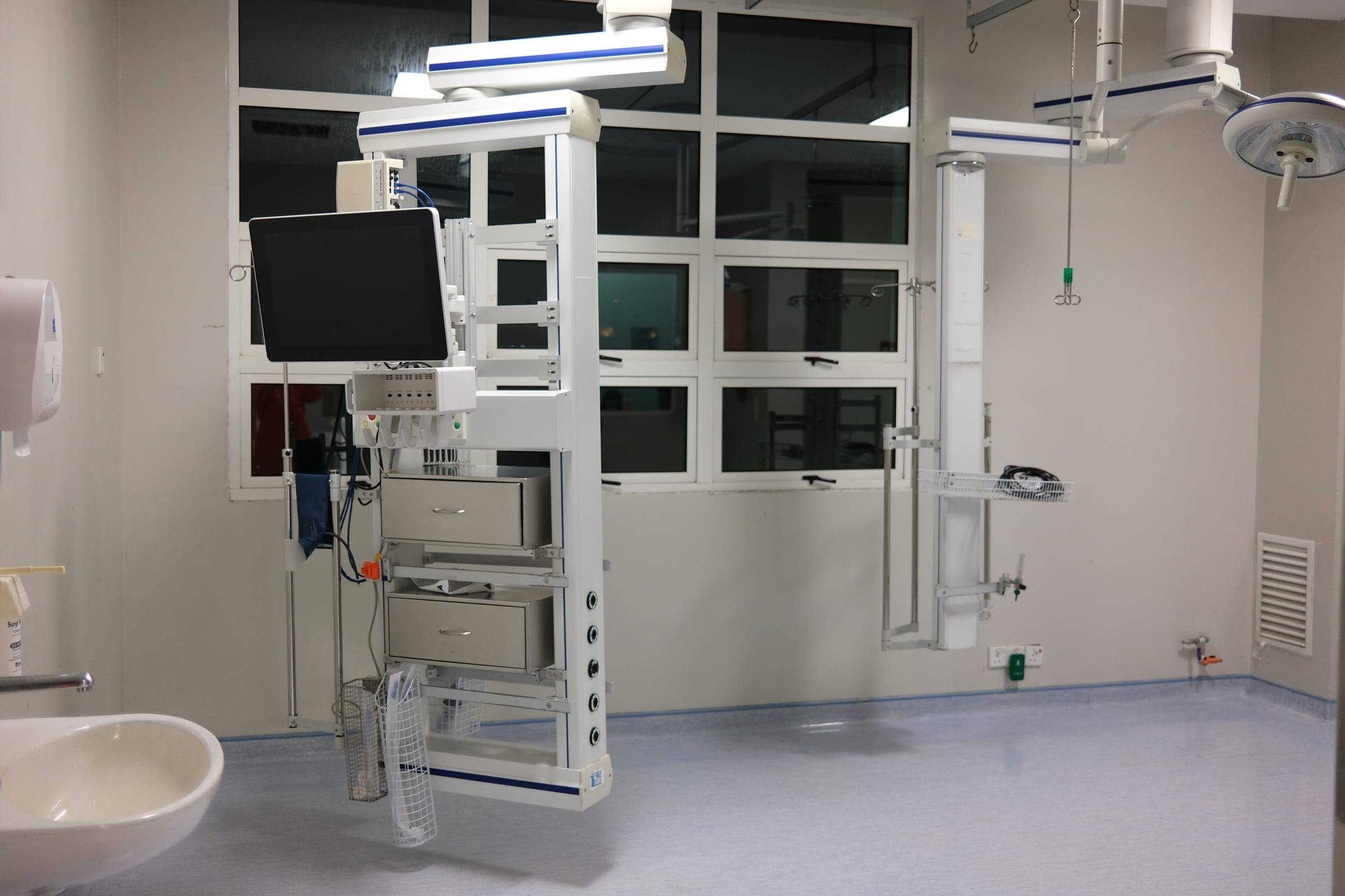 Negative-pressure isolation room at Hospital Shah Alam, with the exhaust louvre at floor level